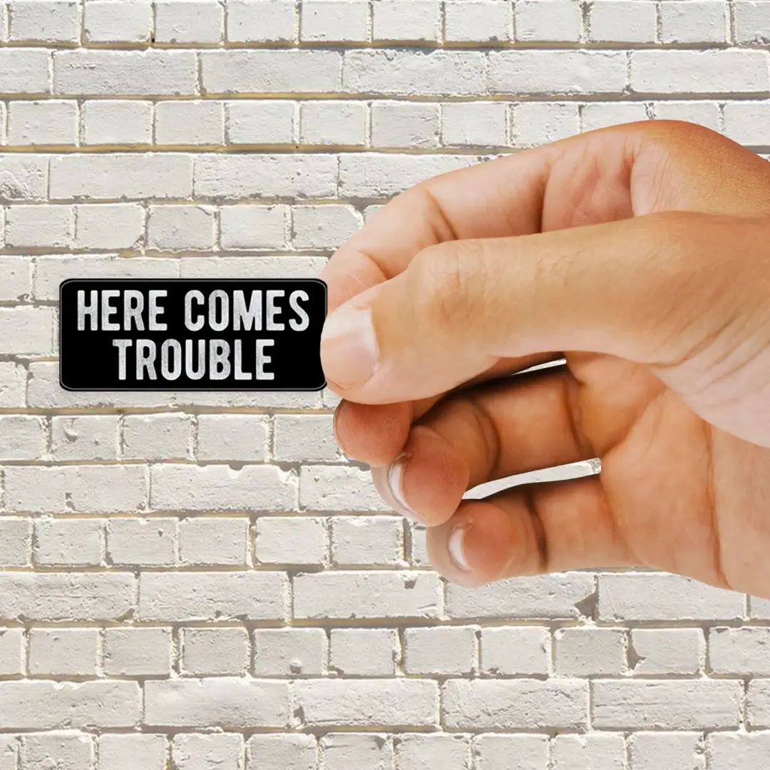 Here Comes Trouble Sticker