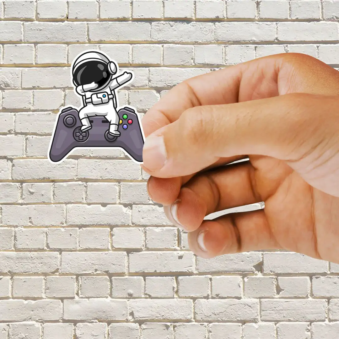 Niedlicher dabbender Astronaut mit Gamecontroller Sticker
